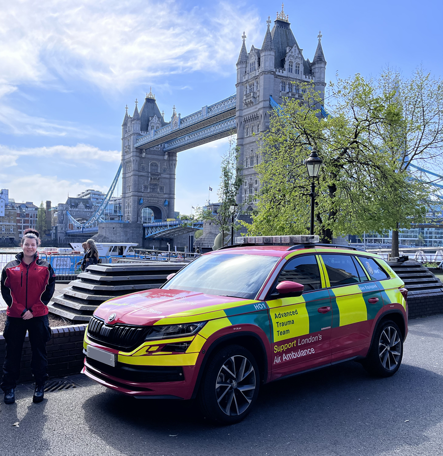 Personnel stands by medical vehicle, next to London Bridge.